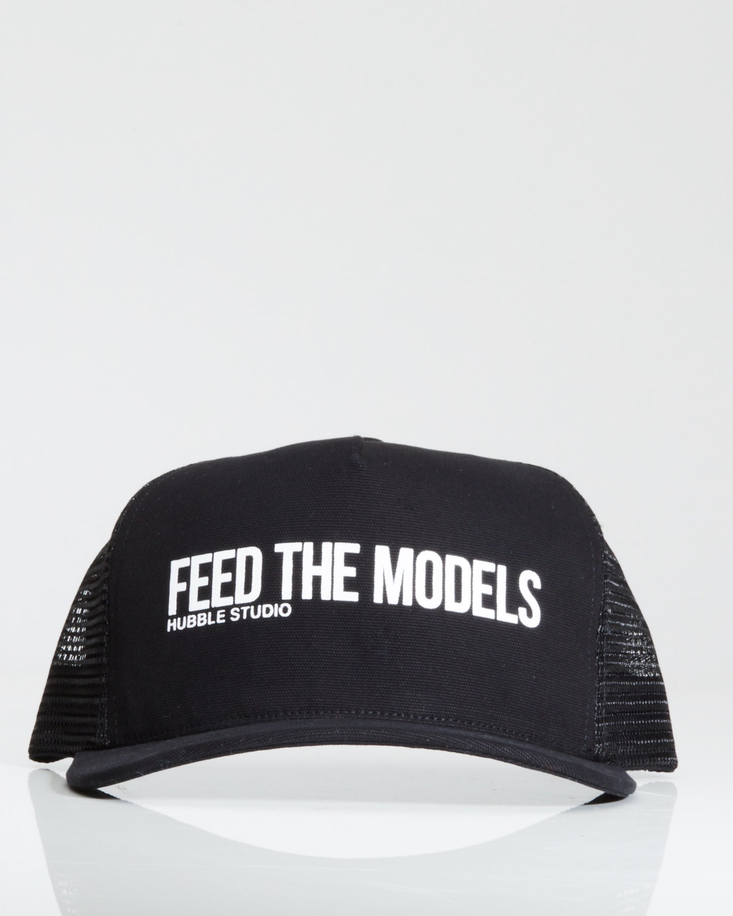 Feed The Models Trucker Hat